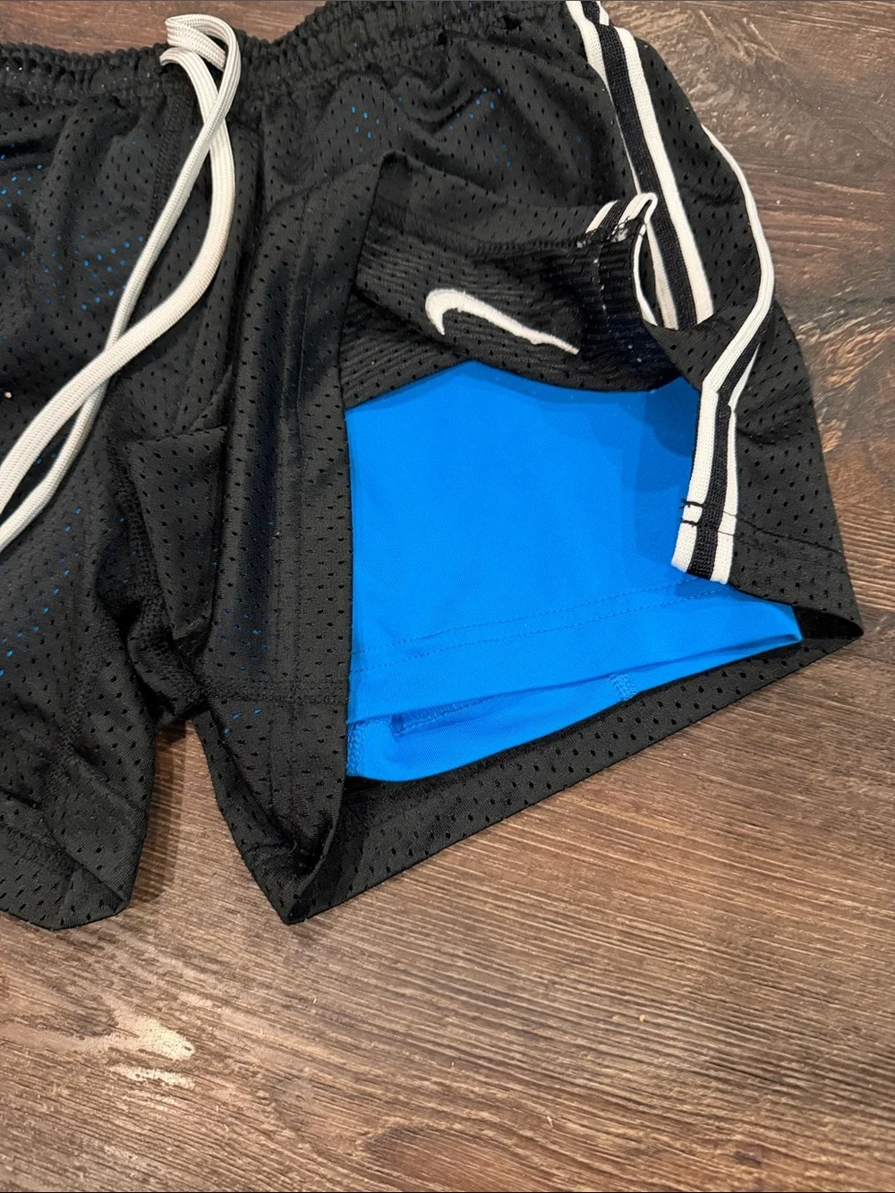 Nike Black Athletic Shorts with Blue Liner and White Trim